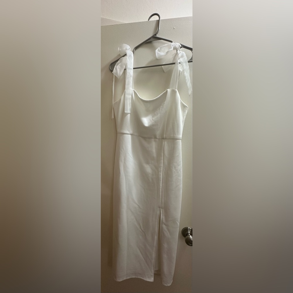 Lulus white midi dress with bows size medium. Worn once for rehearsal dinner.